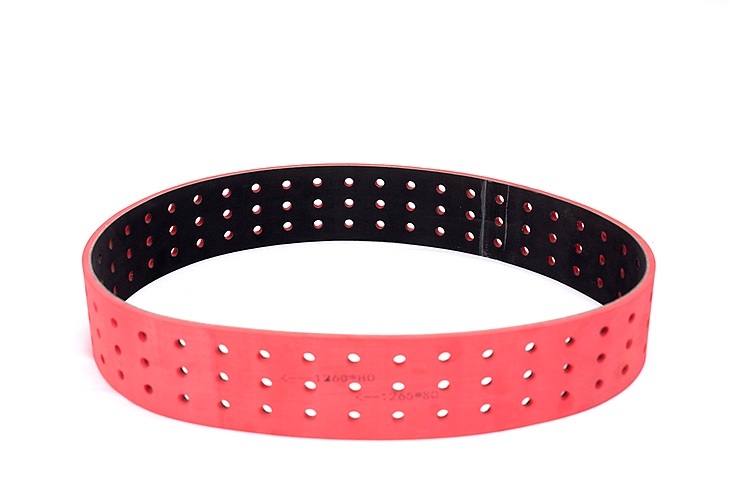 Red plastic perforated belt